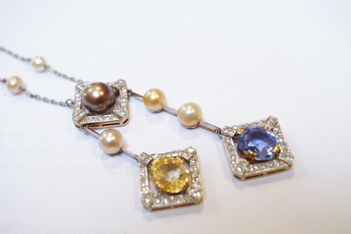 An Art Deco sapphire, natural pearl and diamond necklace, circa 1920